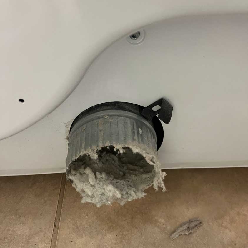 dirty dryer vent before being cleaned in Del Webb Spruce Creek FL